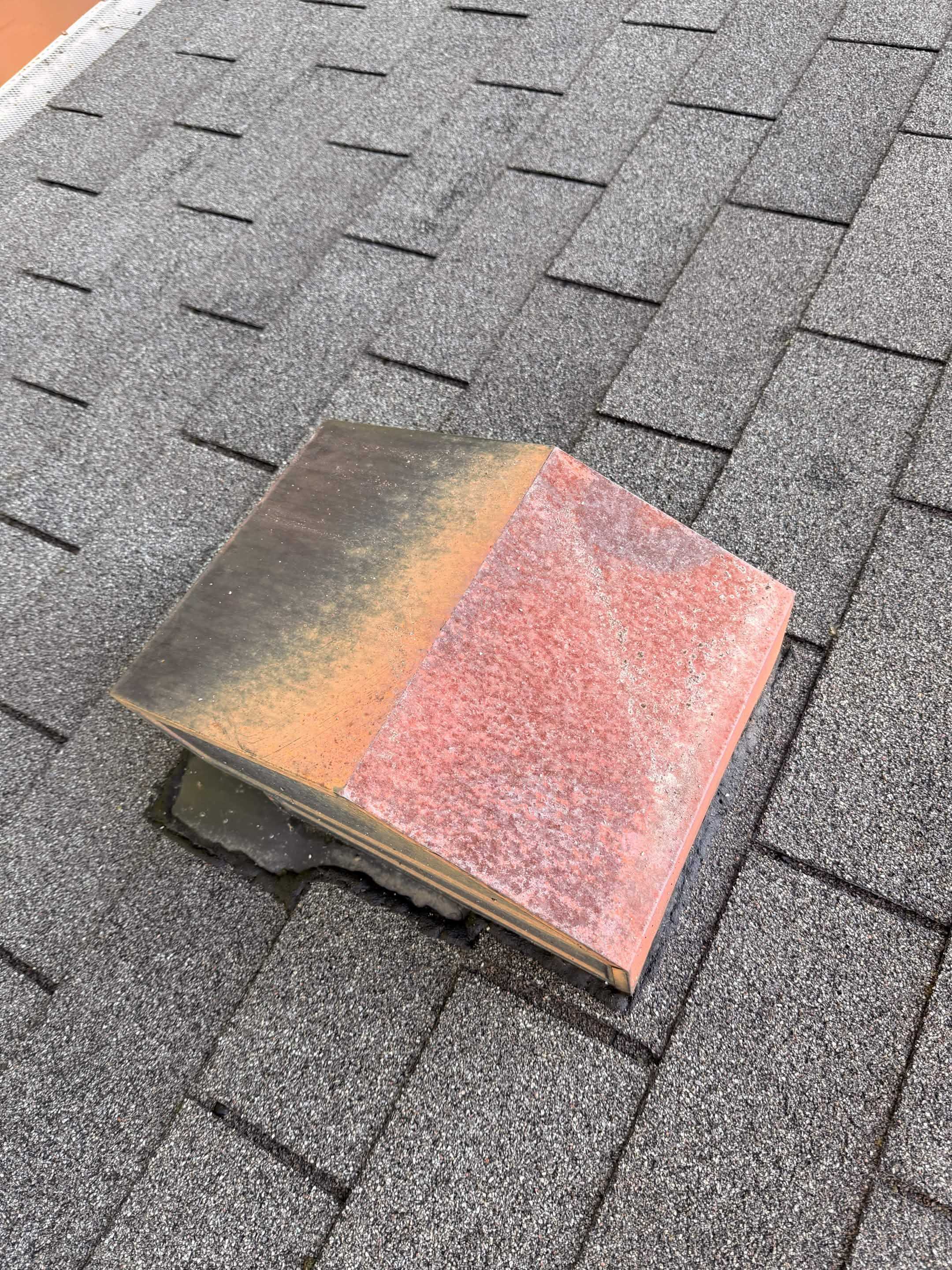 Weathered asphalt shingle sample before protective coating